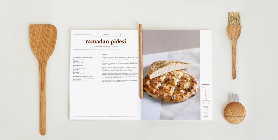 Open spread of the publication showing a ramadan pidesi recipe beside a photo of the bread, with a wooden spatula and brush alongside